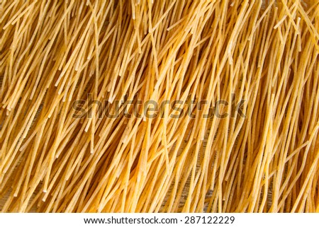 Preparing spaghetti, egg pasta background
