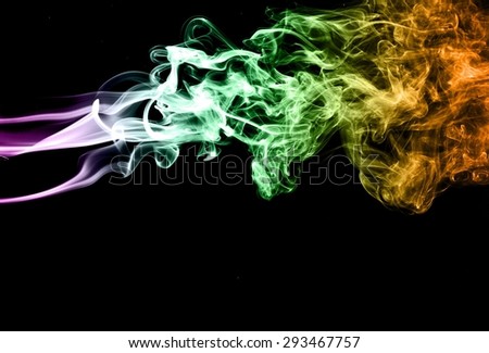 Abstract colorful smoke on black background, smoke background,colorful ink background,Violet, Green, Orange