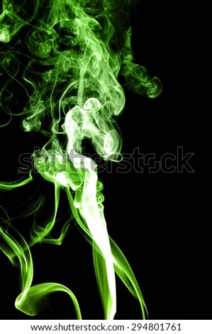 Abstract green smoke on black background, smoke background,green ink background,green, beautiful color smoke