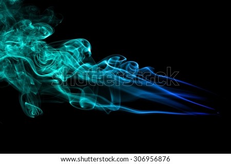 Abstract Light blue smoke on black background, Light blue background,Light blue ink on black background