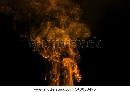 Abstract color smoke on black background, orange smoke background,orange ink background,orange smoke,Orange Smoke  Abstract Wallpaper or Background ,fire and smoke isolated on black