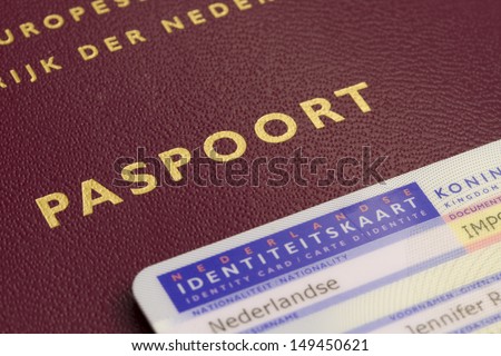 part of a Dutch passport and Dutch ID card