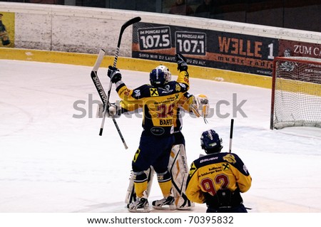 ZELL AM SEE, AUSTRIA - FEB 1: Austrian National League. Zell am See celebrating victory. Game EK Zell am See vs. ATSE Graz (Result 4-1) on February 1, 2011, at hockey rink of Zell am See