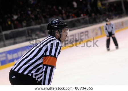ZELL AM SEE, AUSTRIA - FEB 22: Austrian National League. Referee Vedran Krcelic. Game EK Zell am See vs. VEU Feldkirch (Result 3-1) on February 22, 2011 at hockey rink of Zell am See