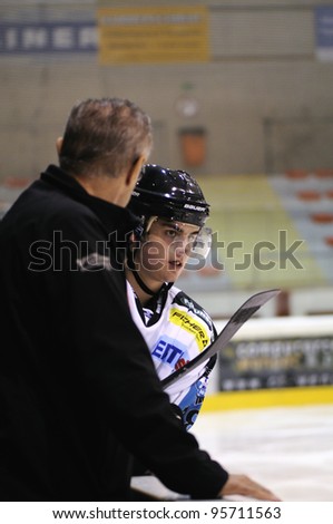 ZELL AM SEE; AUSTRIA - OCT 01: Austrian National League. The coach of Linz tells his player Nachbaur Ralph-Maria how to play. EK Zell am See vs Linz II (Result 5-2) on October 01, 2011 in Zell am See.