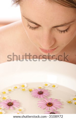 Stock photo of a young woman, beauty concept, facial wash
