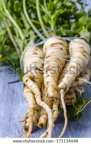 parsley root on a wooden board