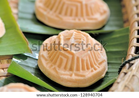 Chinese glutinous rice cake flavored with sweet potato, or local called ang-ku-kueh