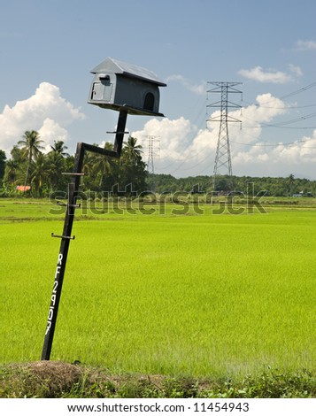 a bird\'s house used at the paddy field to control the invasion of mouse on crops