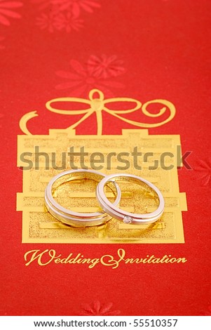 stock photo wedding ring on red wedding card with chinese character