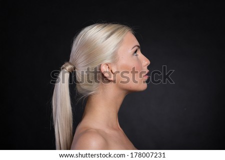 Natural looking women profile with hair bun