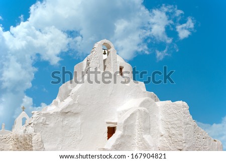 Old Paraportiani 14 century church in the clouds - the most famous and popular place on the island Mikonos in Greece