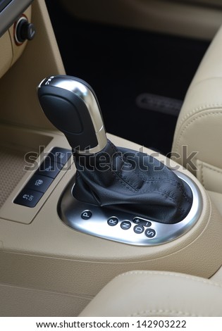 Clutch control lever with leather cover.