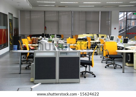 The company office with clapboard tables,computers and other furniture.