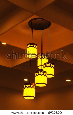 The pendant lamp of golden color.