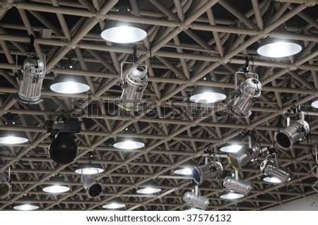 The ceiling lamps of a big music hall.