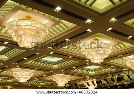 Luxury hotel conference room ceiling with lighting.