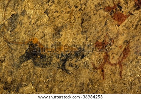 Bushman paintings, Lion  and bushman running, Eastern Cape, South Africa
