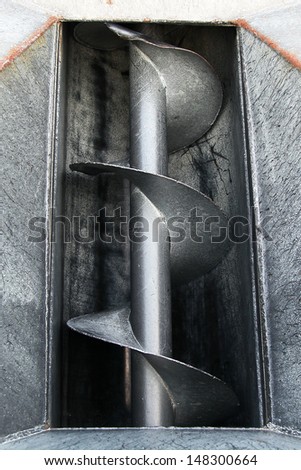 Metal screw conveyor helix on shaft