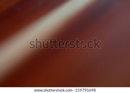 Background with diagonal white stripe on red from black wood