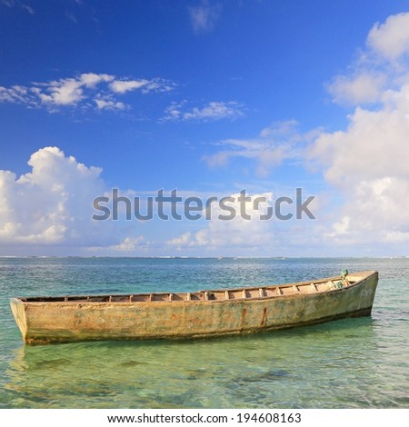 Boat floating on calm ocean, Mauritius