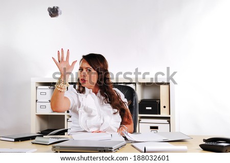secretary to throw creased paper