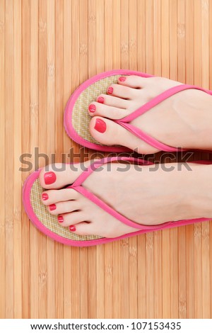 Female feet with flip-flops