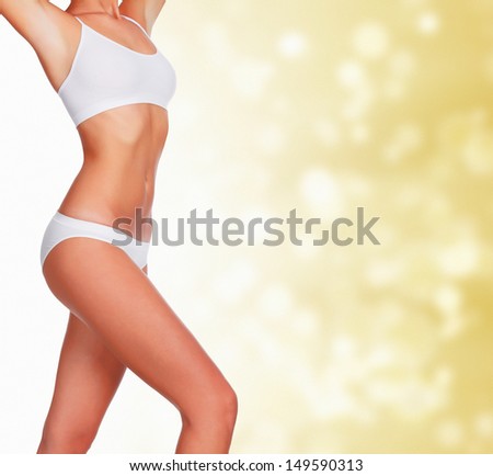 Slim woman against abstract background with circles and copyspace