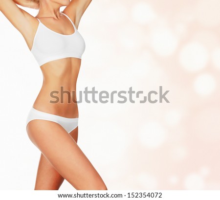 Slim woman against abstract background with circles and copyspace