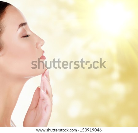Beautiful asian woman against an abstract blurred background Beautiful asian woman against an abstract blurred background