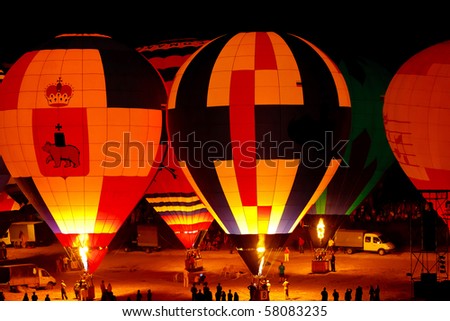 KUNGUR, RUSSIA - JULY 3: Hot air balloons ready to take off at the annual Kungur Hot Air Balloon Fiesta on July 3, 2010 in Kungur, Russia.
