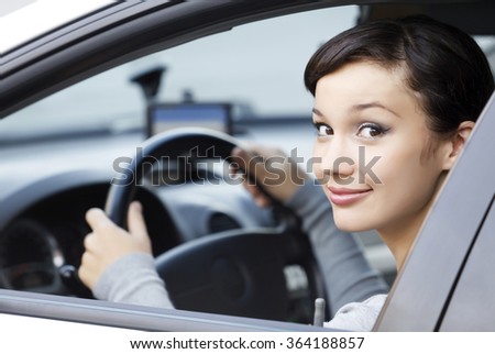 Pretty girl in a car