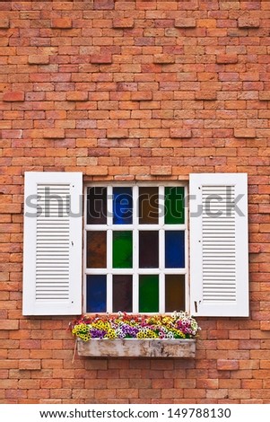 Window on Brick wall, flower