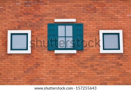 Window green on Brick wall