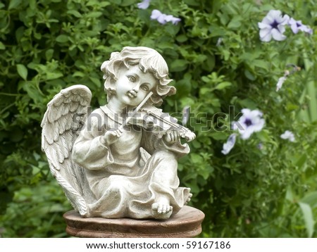 [Obrazek: stock-photo-figurine-of-an-angel-playing...167186.jpg]