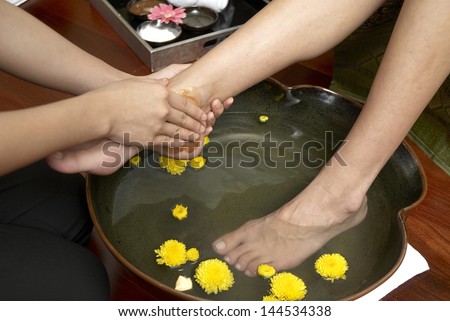reflexology foot massage, spa foot treatment by hand herb,Thailand