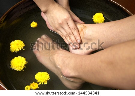 reflexology foot massage, spa foot treatment by hand herb,Thailand