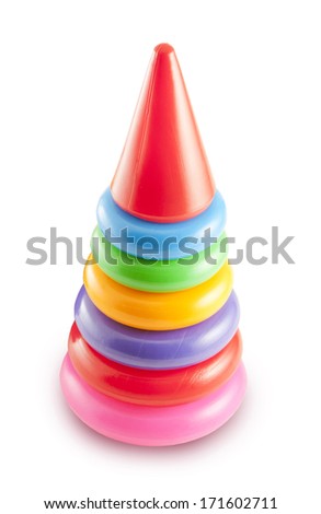 Pyramid build from colorful plastic rings, isolated on white background. Toy for babies and toddlers