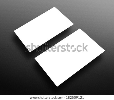 Blank business cards on black leather background