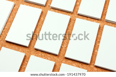 identity design, corporate templates, company style, blank business cards on corkboard background
