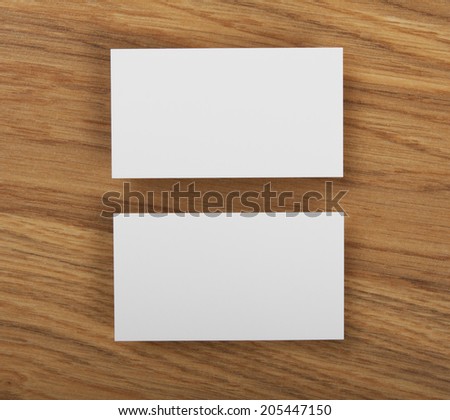 identity design, corporate templates, company style, blank business cards on a wooden background