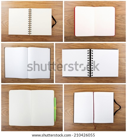Set of color open notebook on wooden background