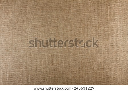 Closeup of brown textured surface, burlap texture background