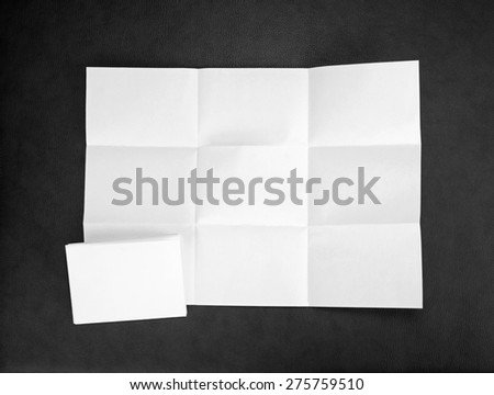 White sheet of paper folded in nine top shooting
