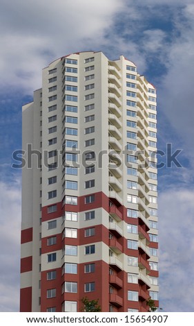New apartments building in Kyiv on blue sky background.