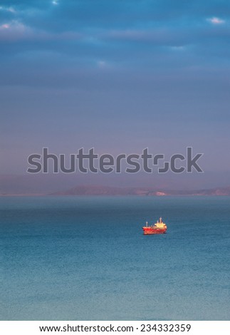 Morning landscape with a red ship