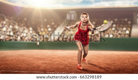 female tennis player with a racket on a tennis court in action