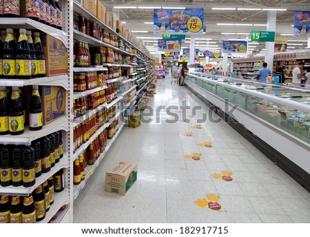 SAMUI - FEBRUARY 16: Aisle view of a Tesco Lotus supermarket on FEBRUARY 16, 2014 in Samui, Thailand. Tesco is the world\'s second largest retailer with 6,531 stores worldwide.