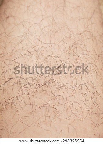 Mans hairy leg closeup