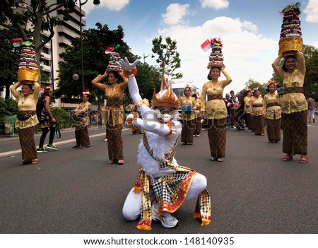 PARIS - JULY 6 - An unidentified dancer portrays the Indonesian monkey god, Hanuman, in Paris' annual Carnaval Tropical, celebrating the former French colonies, on July 6, 2013 in Paris.